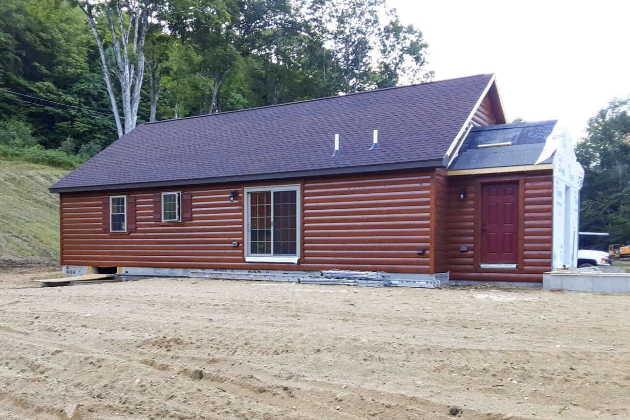rear elevation with patio doors Prefab Cabin in Dummerston VT