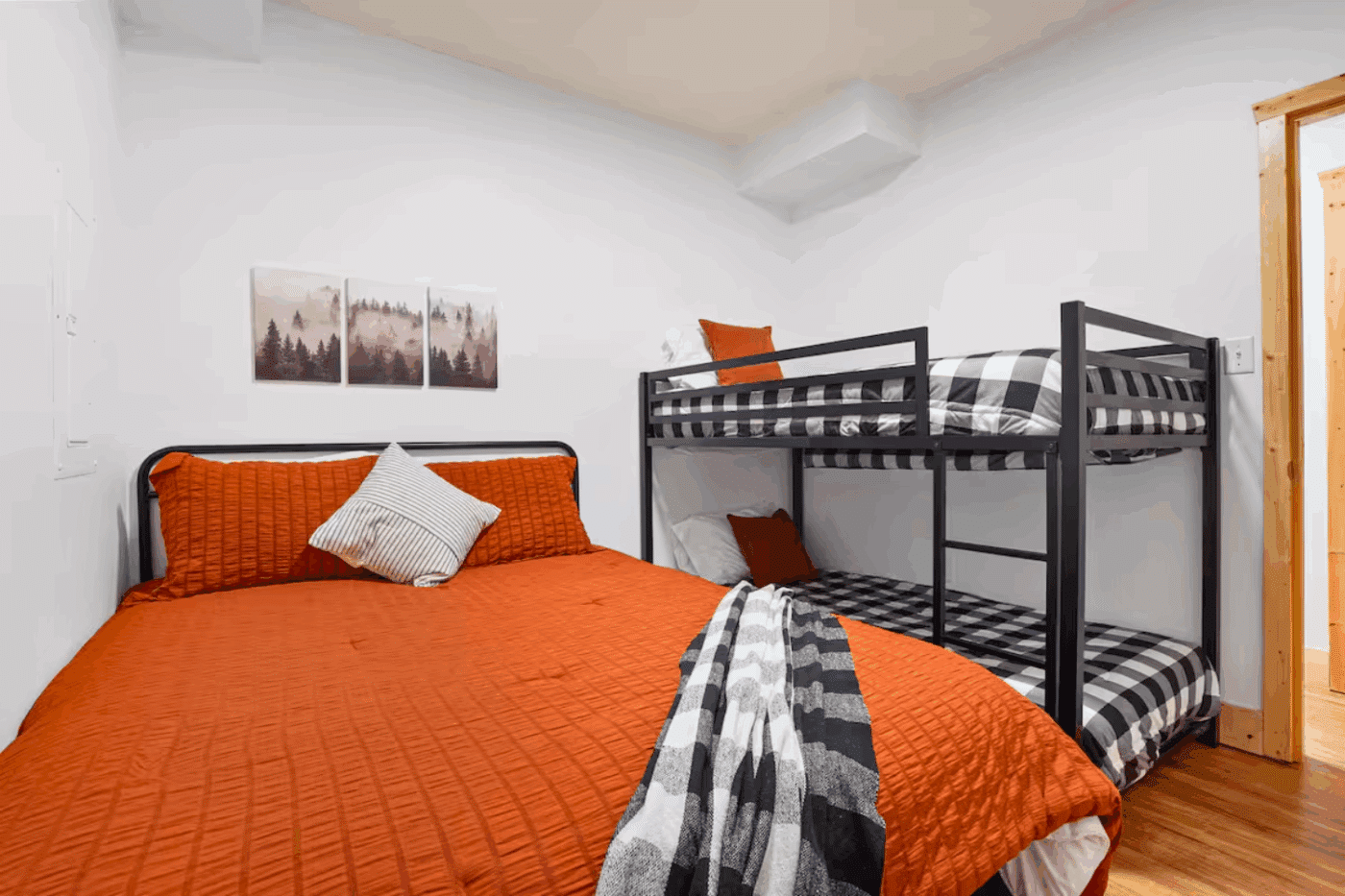 Bedroom 9 in customer finished basement of mountaineer log cabin deluxe modular home built and designed with Psy Homes in Gap Pa