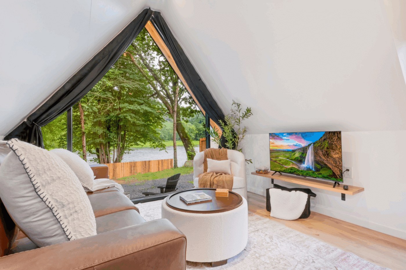 living room area of A frame Studio in pond eddy new york Rushing Water 2 at at The Outpost Resort