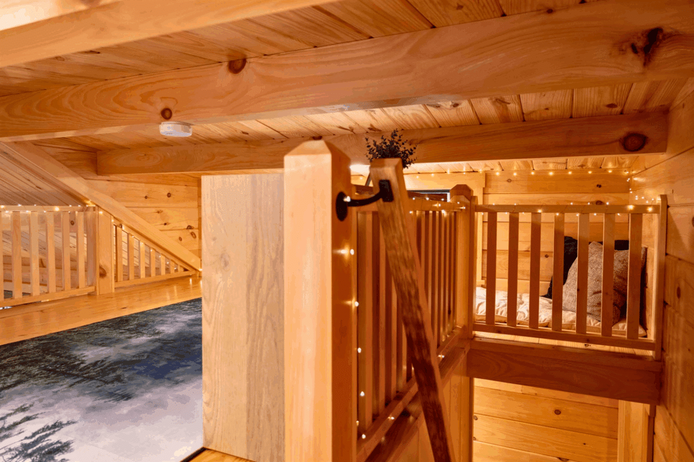 lofted hangout nook in Aspen park model tiny home built and designed by Psy Homes