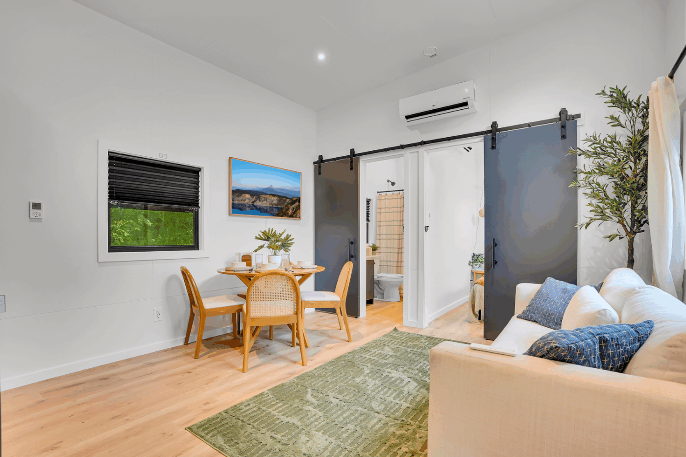 living room and dining area of cascade park model tiny home in Alexandria Pa Cascade site 15