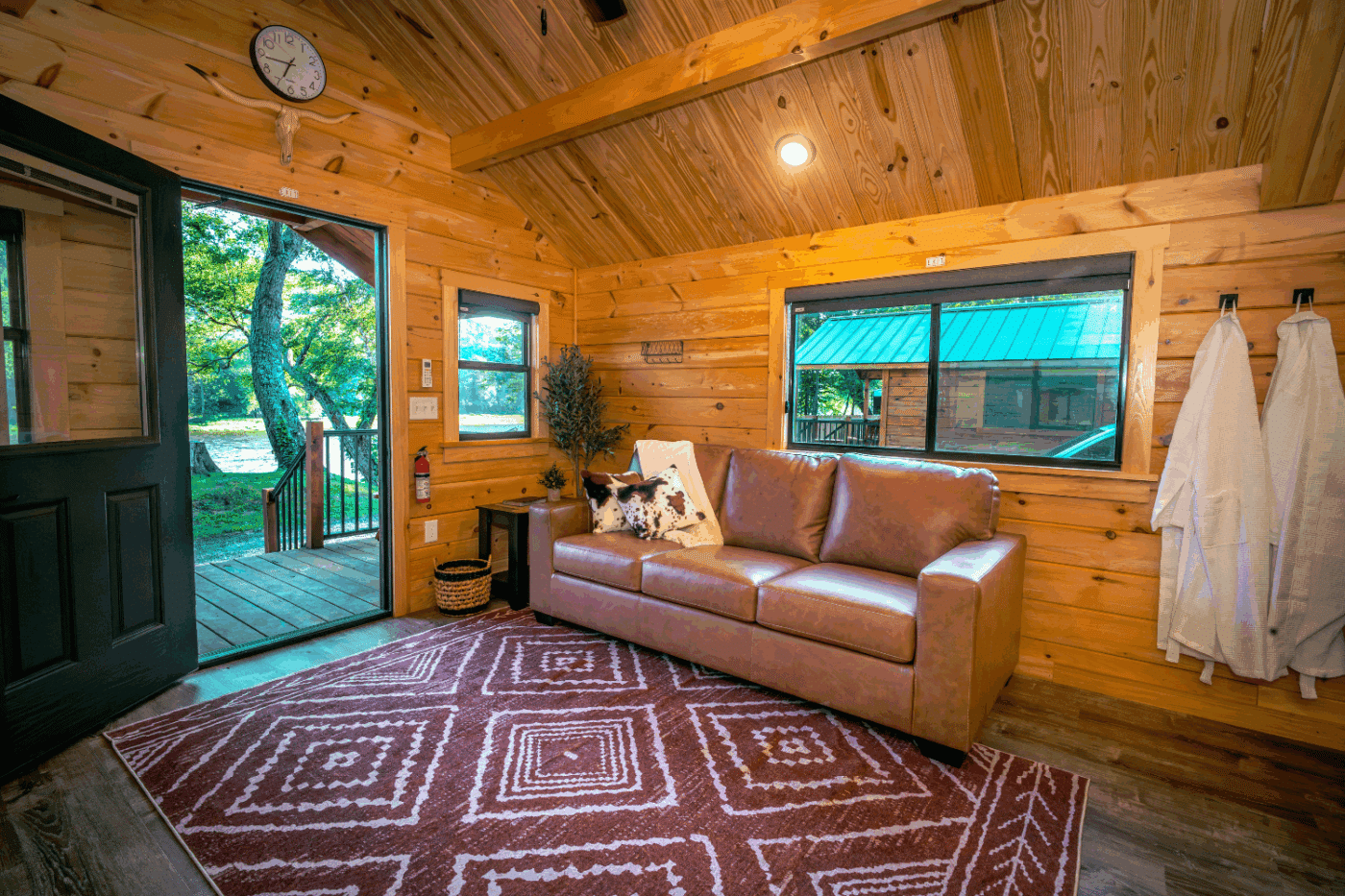 Log Studio park model tiny home at The outpost resort in Pond Eddy New York built and designed by Psy Homes cabin 3