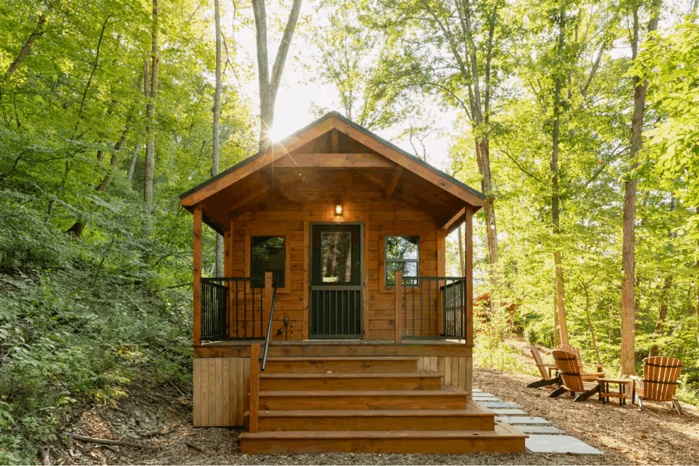 front porch of studio log park model tiny cabin in James creek pa studio 2