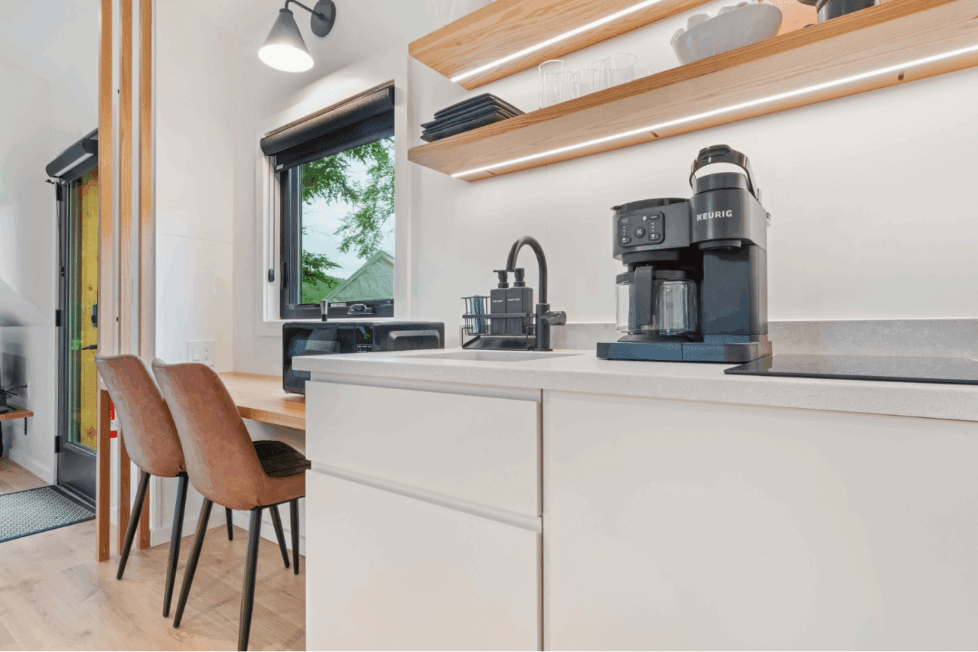 Rushing Water 1 A frame park model tiny home kitchenette in Pond Eddy New York at The Outpost Resort