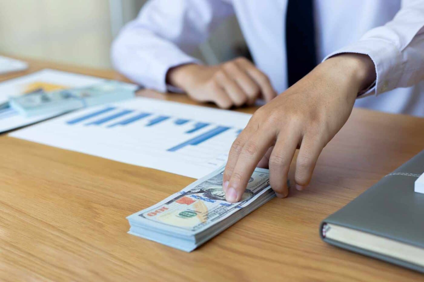 Home Equity loan lender with chart and stash of cash