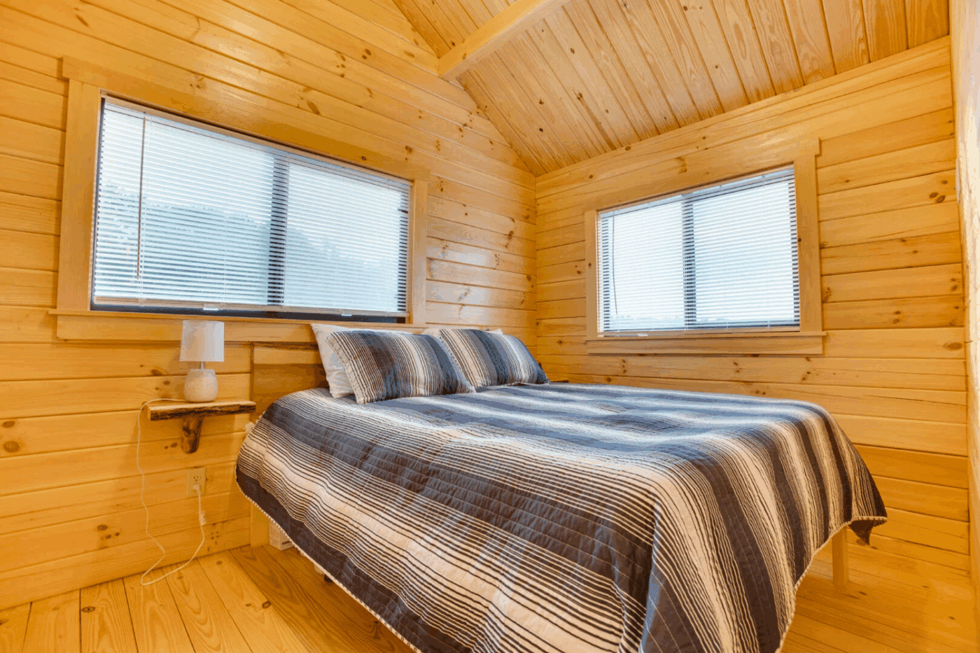 main bedroom in Pinecrest park model tiny home built and designed by Psy Homes located in gap pa with tiny house in Warfordsburg Pa