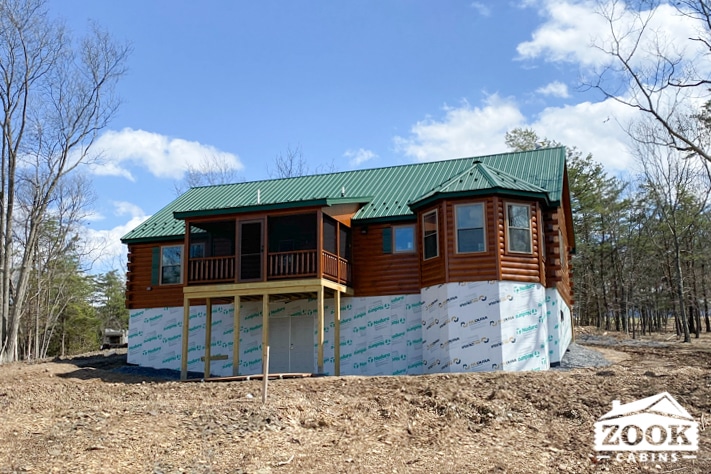 Frontier log cabin in petersburg wv with large screened in porch