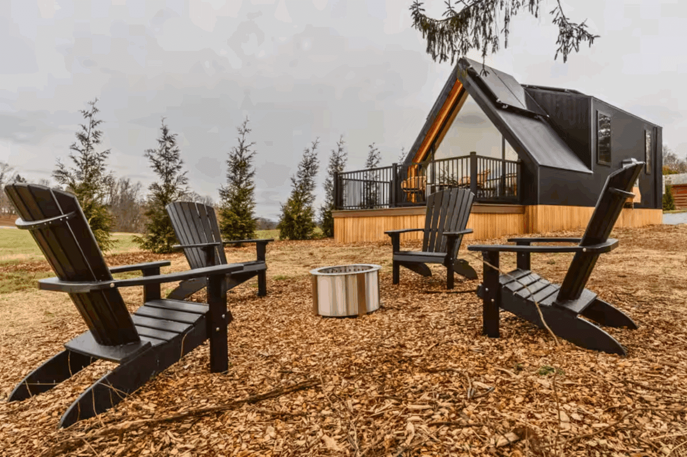 outdoor hospitality area of A frame park model tiny home built and designed by Psy Homes