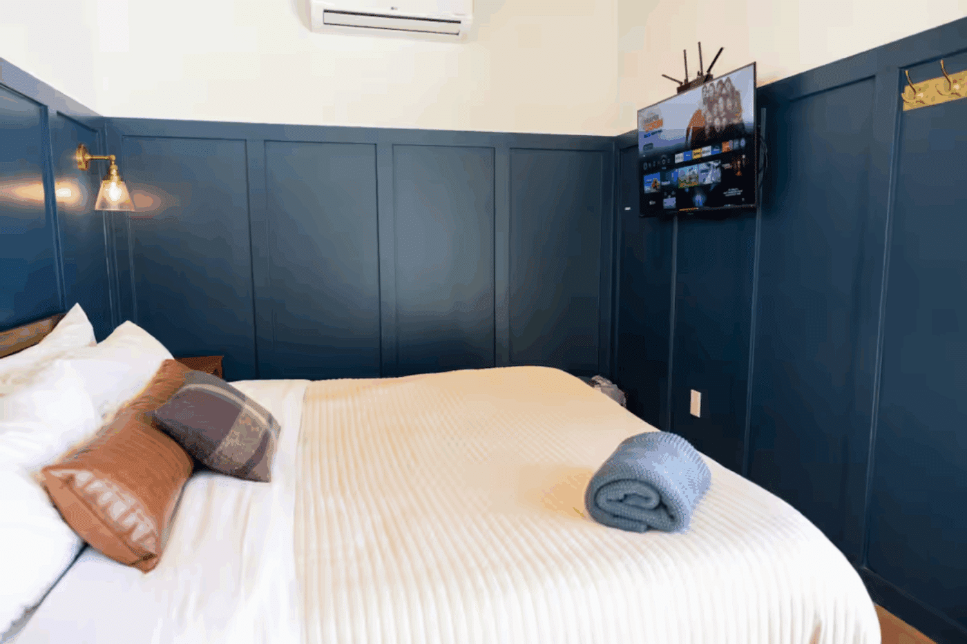 bedroom of custom Alpine park model tiny home built and designed by Psy Homes