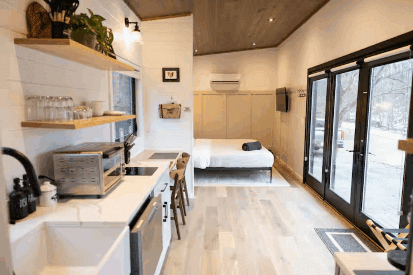 view of kitchen and dining area in Madison Virginia built and designed by Zook CAbins Alpine 3 park model tiny home