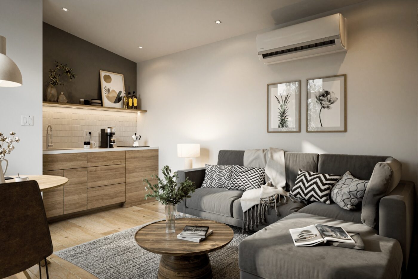 Cozy living room in a park model home with sectional sofa, wood coffee table, and kitchenette.