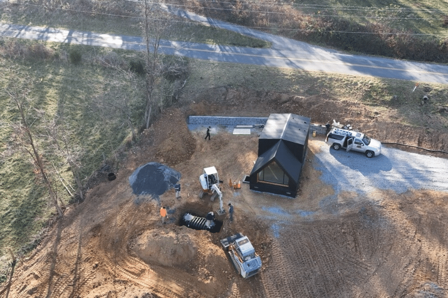 a black A frame ADU being built in Washington