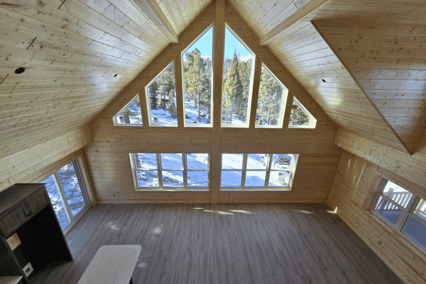 30x48 Log Glacier Holloway in Angel Fire NM with white pine walls