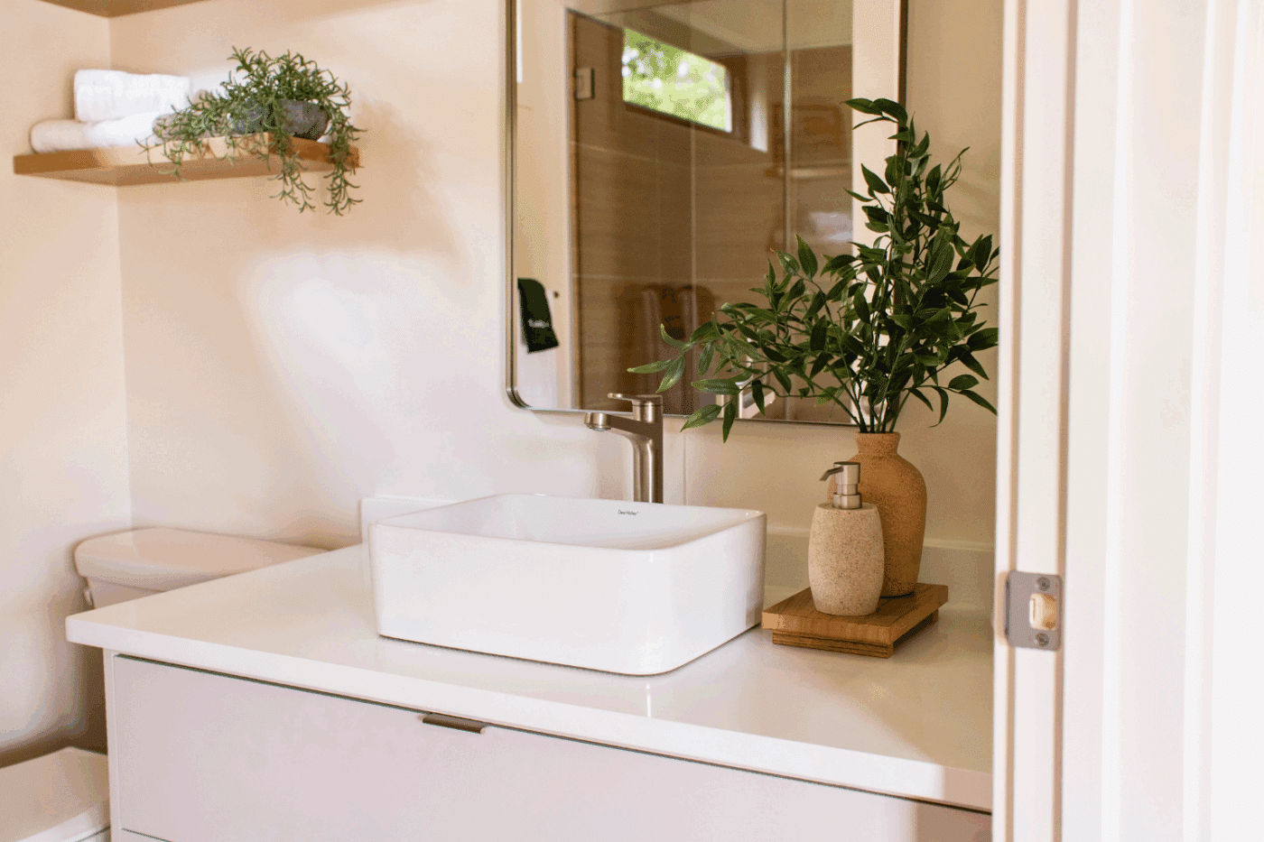 vanity and and toilet of Sonoma park model tiny home at Rd Run Resort site 103 built and designed by Psy Homes