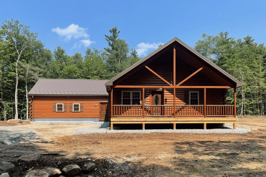 Settler log cabin in Pennsylvania surrounded by forest.