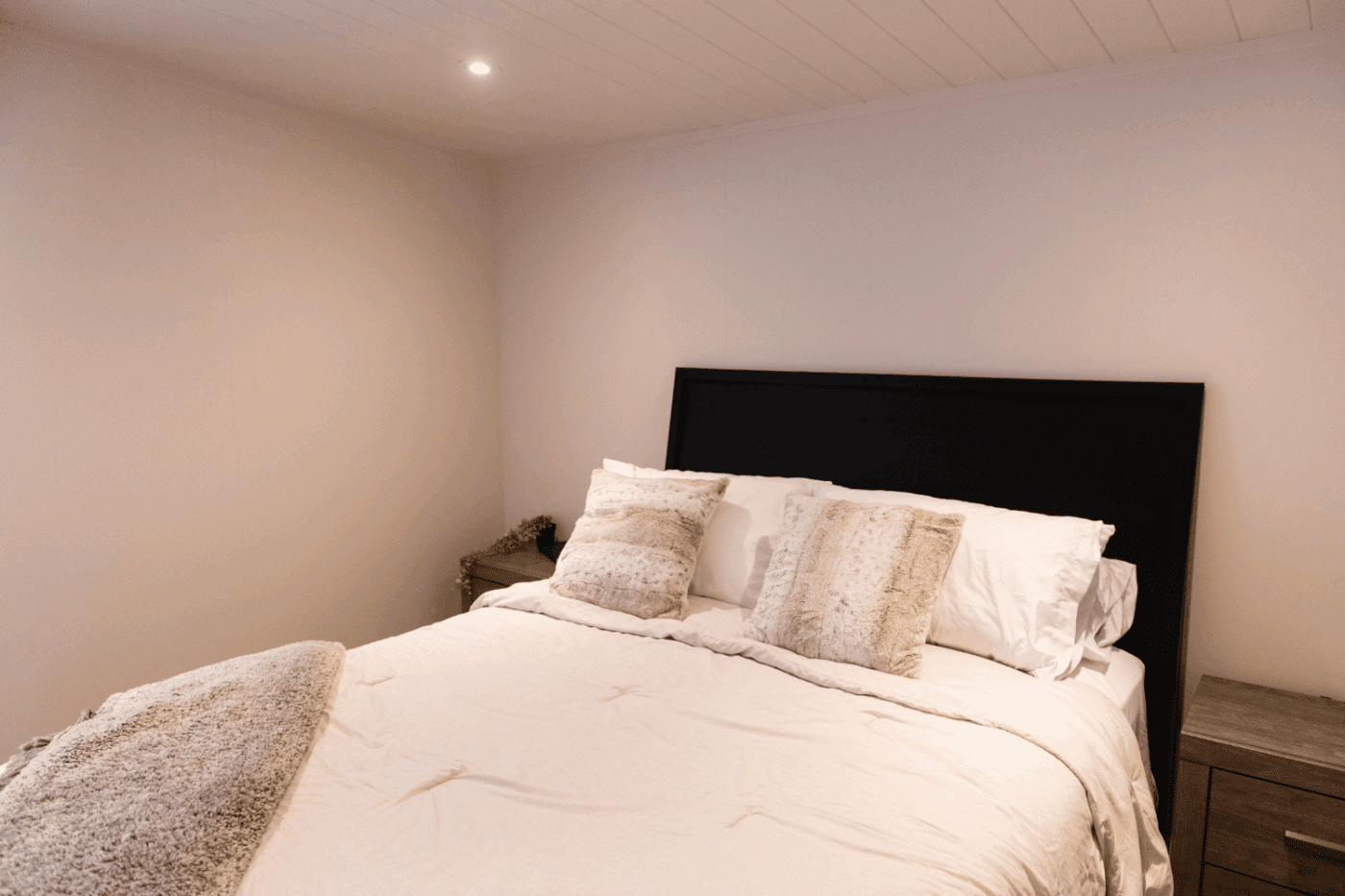 The bedroom of the Rockwood park model tiny home in New Holland pay built and designed by Psy Homes