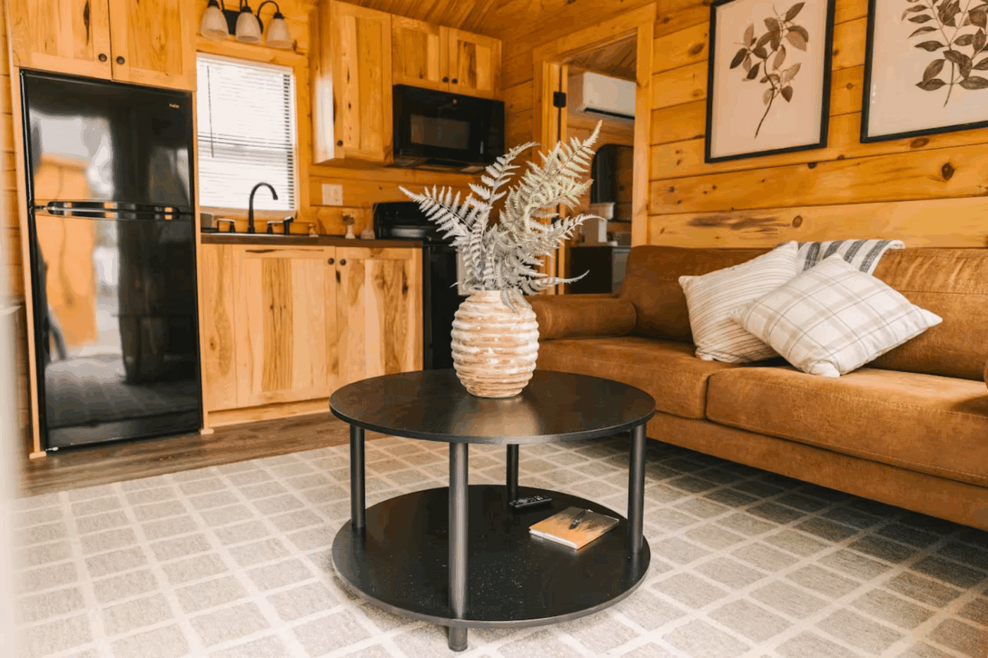 Pinecrest park model tiny home built and designed by Psy Homes kitchen and living room