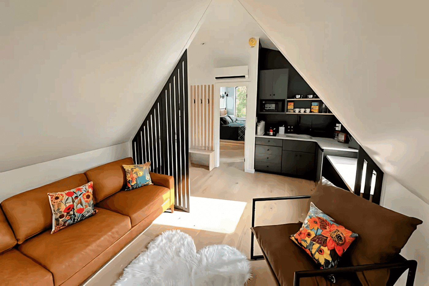 A Frame Park Model living room and kitchen area built by Psy Homes in Eastern New York