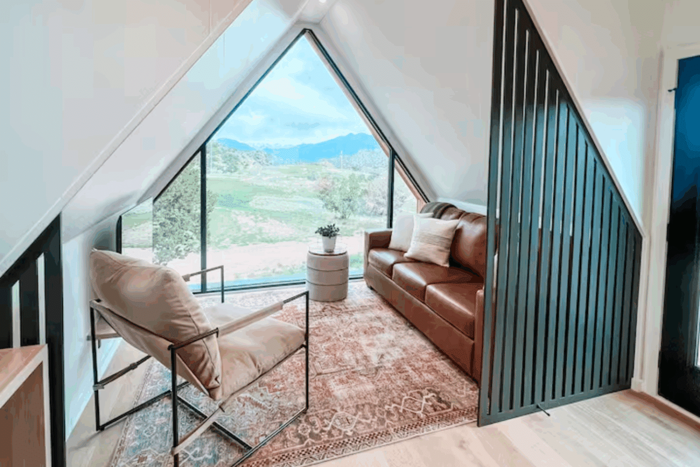 living room of A frame park model tiny home in Cañon City Colorado at Royal Gorge RV Resort Peakview 4