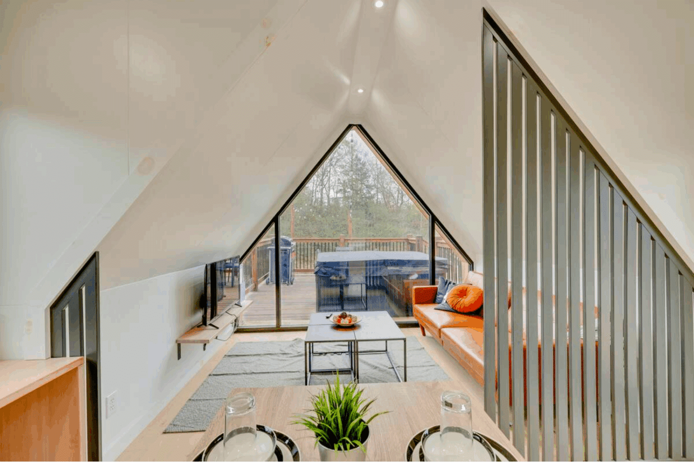 living room of a frame park model tiny home in broken bow OK built and designed by Zook cabins