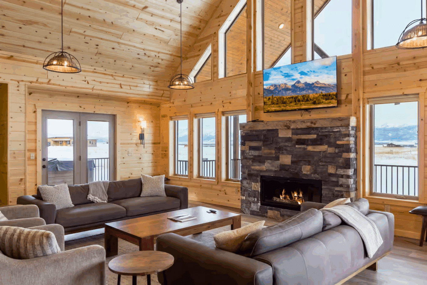 living room of Canyon Lodge log cabin modular home in Driggs Idaho