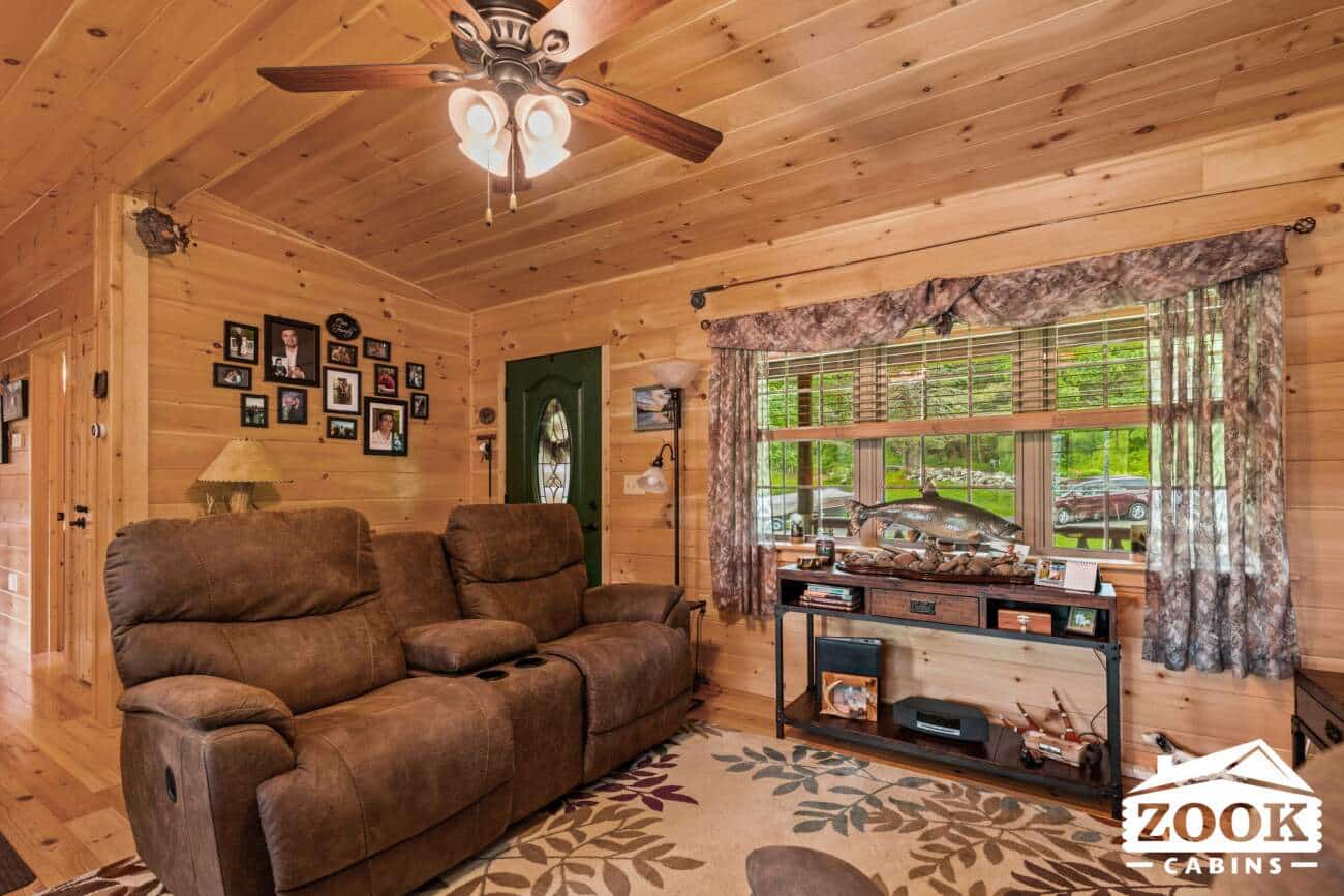 Living room 26x44 Frontier Log Cabin in Monson MA