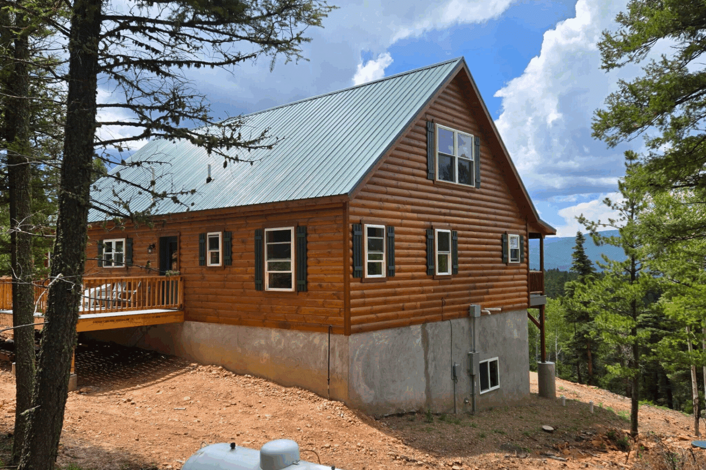 Log 30x48 Glacier Cabin Holloway Angel Fire NM Psy Homes Amish built log cabin