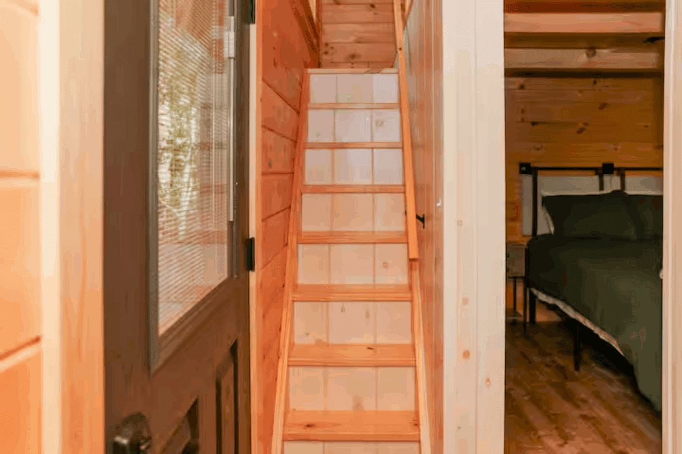 stairway to lofted sleeping area of Pinecrest park model tiny in James Creek Pa built and designed by Psy Homes in Gap Pa