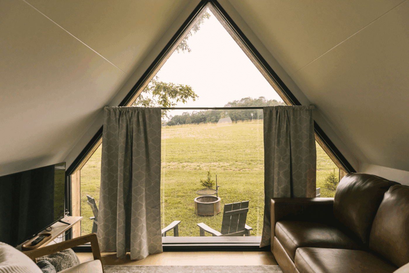living room of A frame park model tiny home at Somerset resort in Friedens Pa site 11