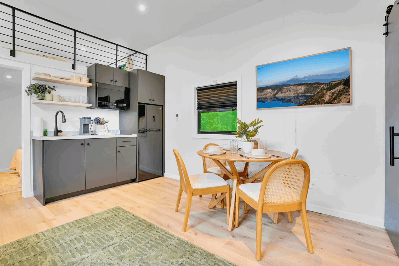 kitchen and dining room area of Cascade park model tiny home in Alexandria Pa Greene hill family campground site 15