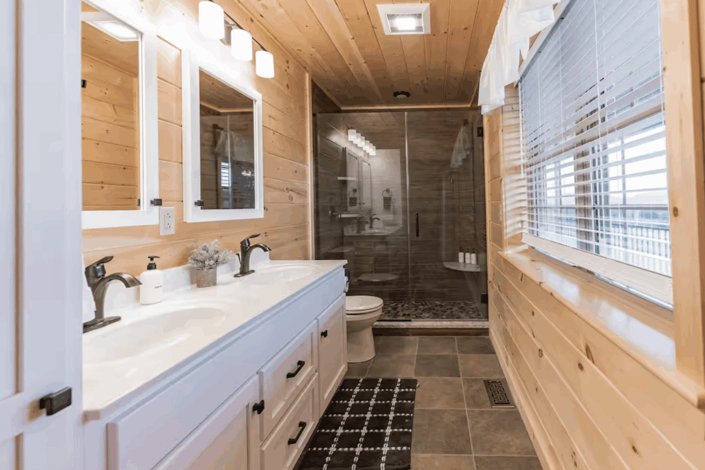 Bathroom of Mountaineer Deluxe modular log cabin in Vermontville New York from Psy Homes