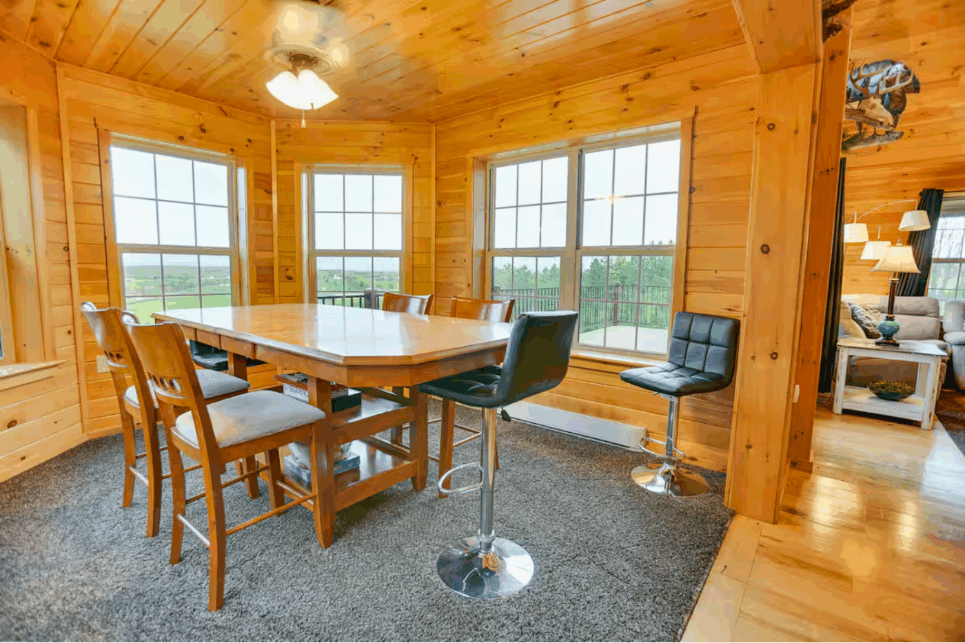 sunroom addition on Mountaineer Deluxe log cabin in Warfordsburg Pa built and designed by Psy Homes