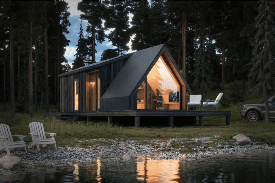 black A frame ADU on platform by the water