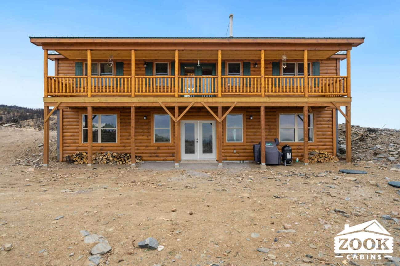 back deck and basement entrance Sunset Ridge Log Cabin in Loveland CO