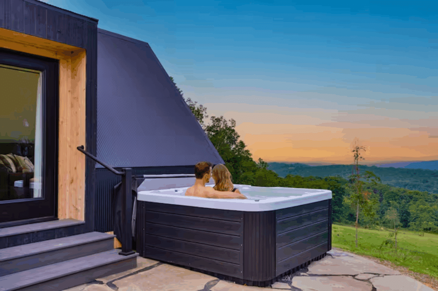 hot tub as a part of outdoor entertainment area of aframe park model tiny home in augusta West Virginia