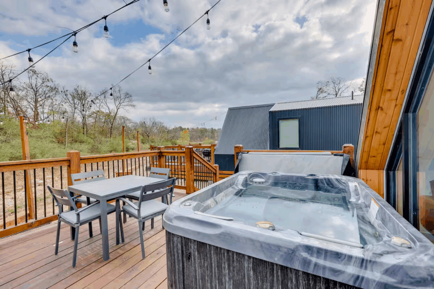 outdoor hospitality area of A frame park model tiny home in Broken Bow OK