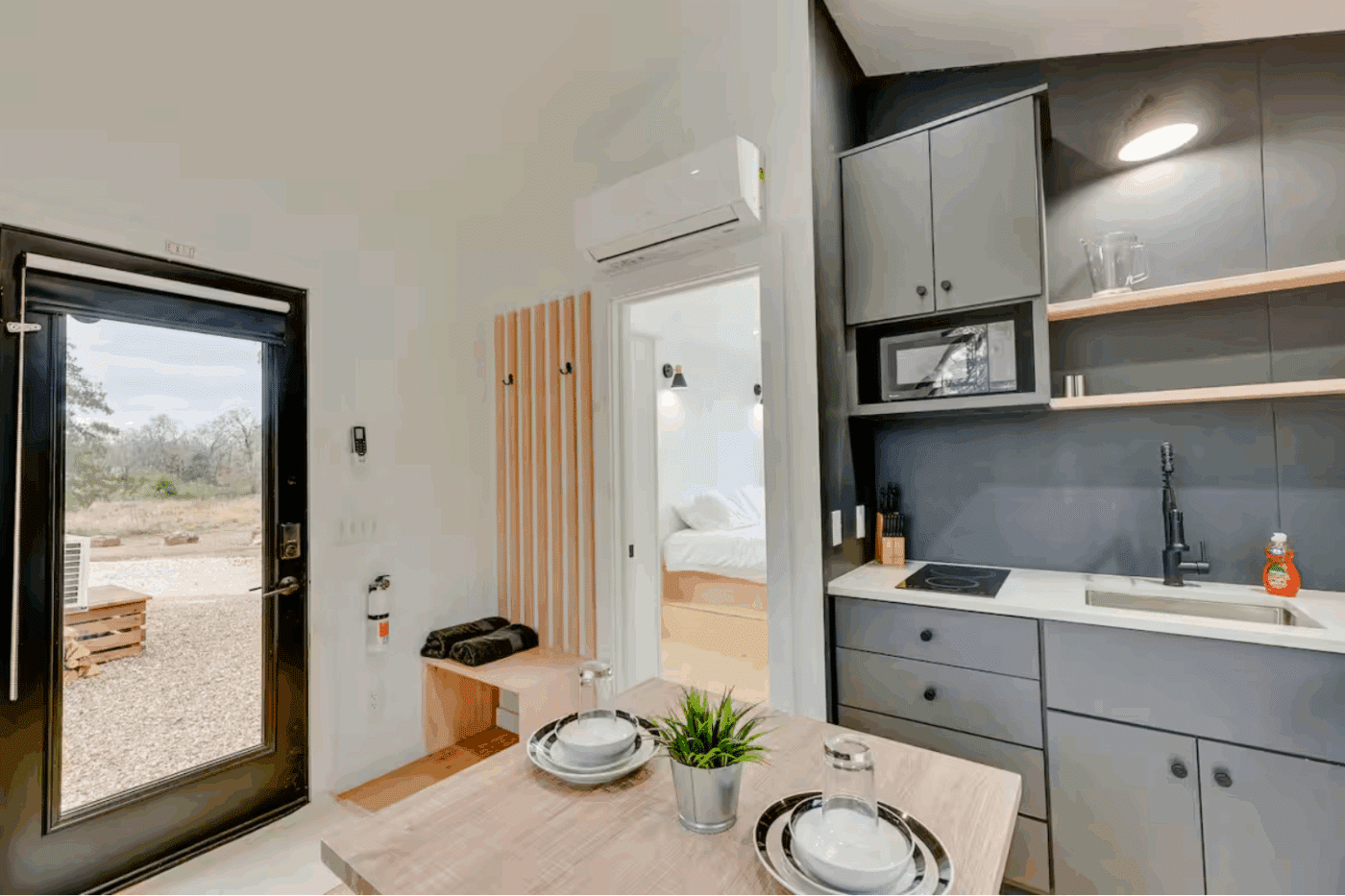 entry way of A frame park model tiny home built and designed by Psy Homes placed in Broken Bow Oklahoma