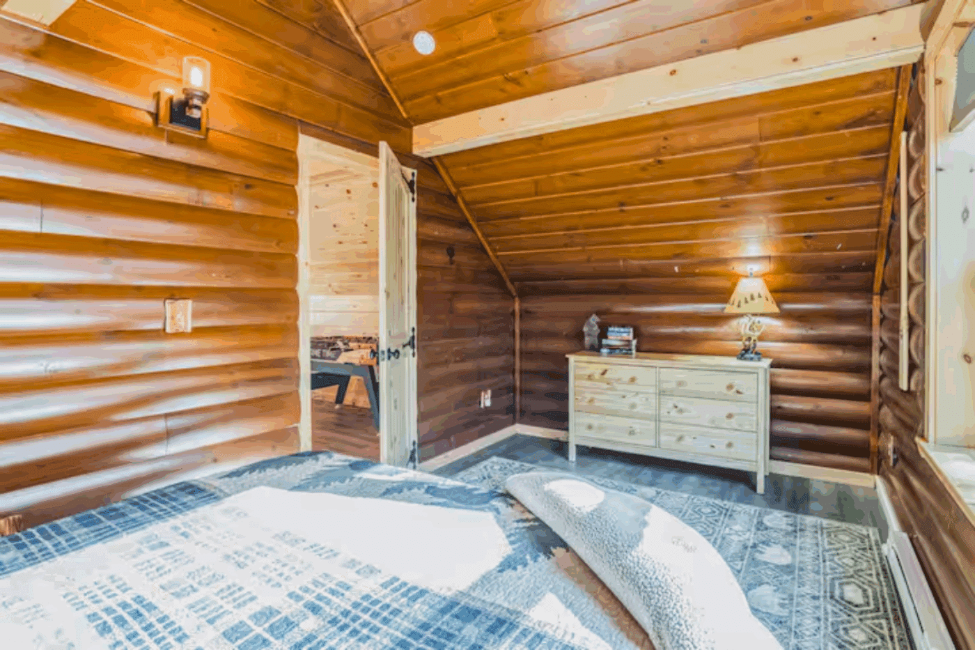 Customer finished off Loft of Mountainaeer deluxe in Old Forge New York with a customer log finished interior