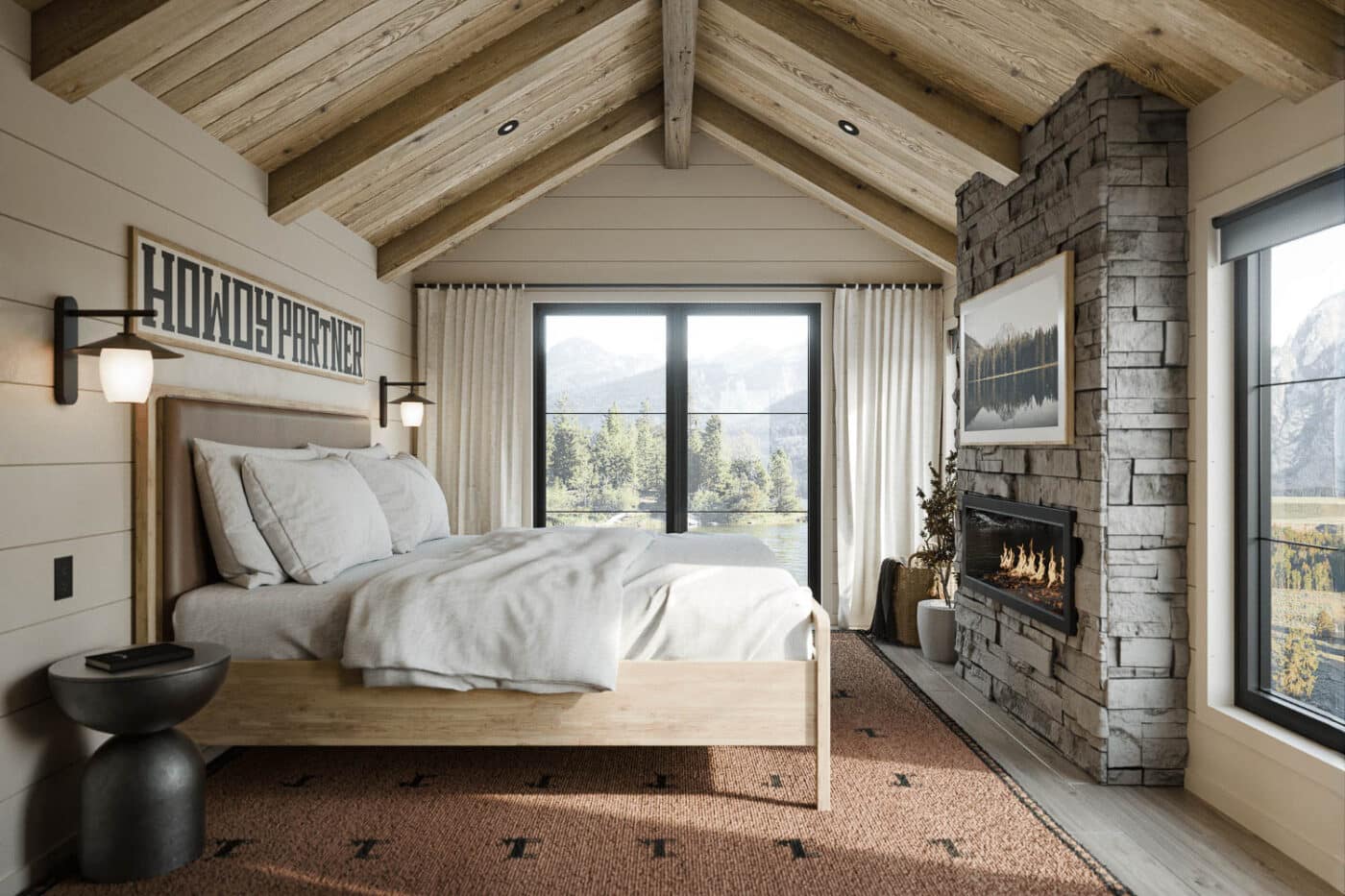 Warm bedroom with wood beams and stone fireplace inside a Yukon park model tiny home.