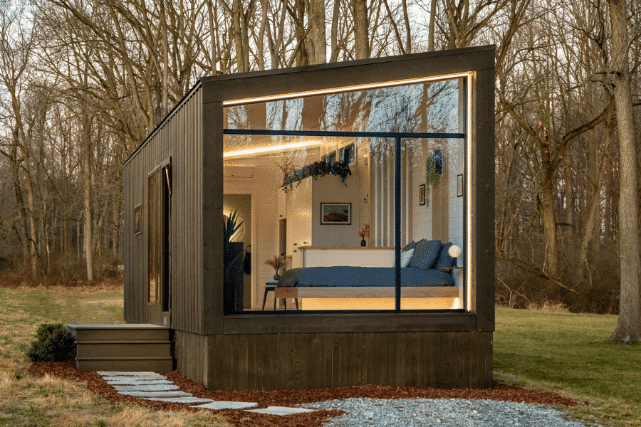 a Luna Park Model tiny home set in a clearing in Louisiana