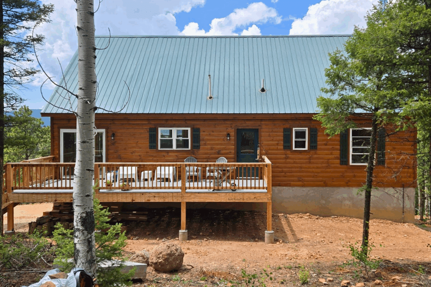 Log 30x48 Glacier Holloway Angel Fire NM back porch with