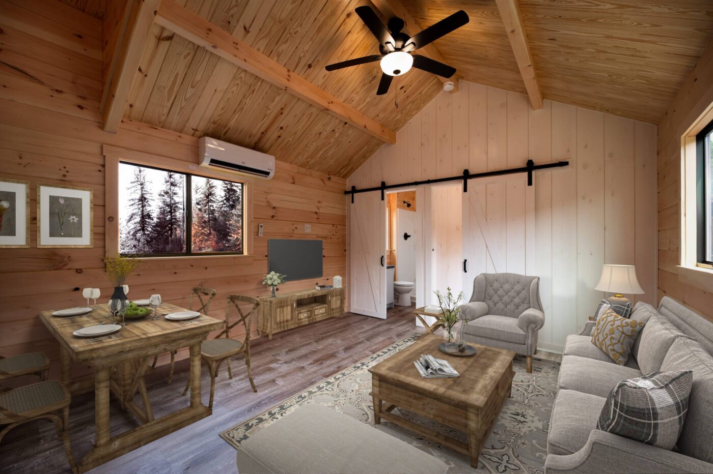 Interior of Pinecrest park model tiny home with wood-paneled walls, dining area, and cozy living space.