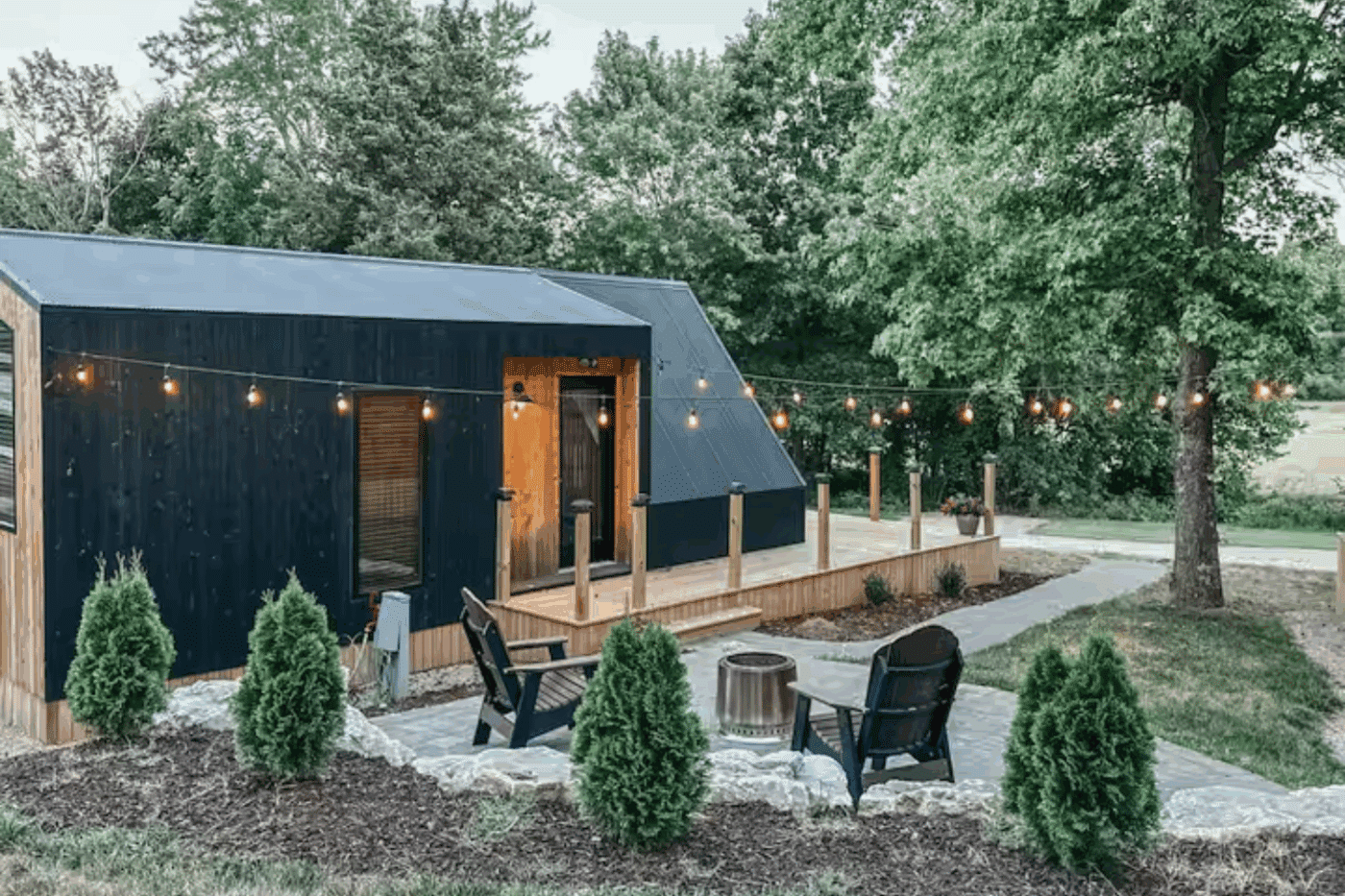 Outdoor hospitality area of A frame park model tiny home in Harrison Arkansas
