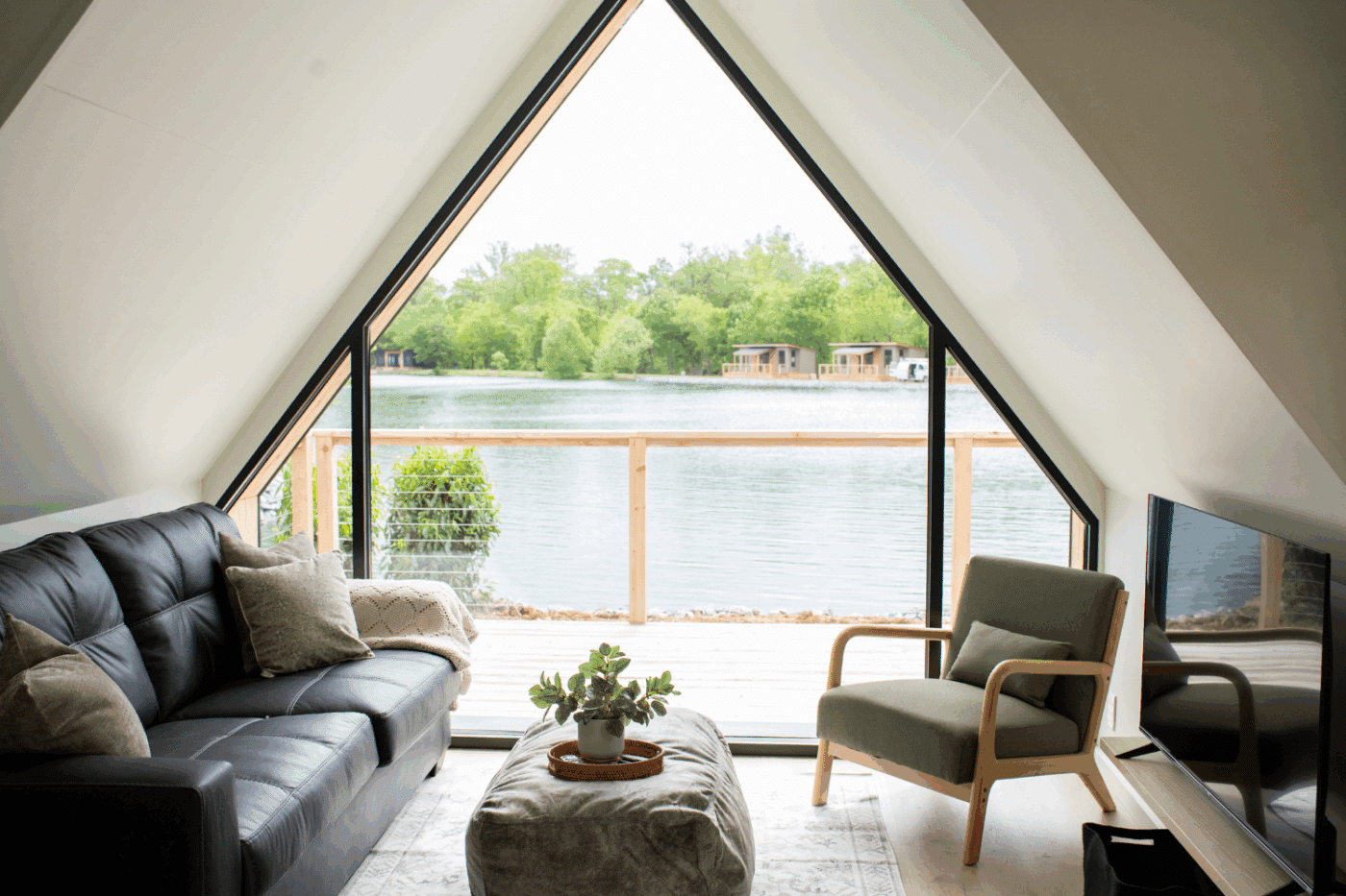Large Living Room of A frame studio Park model tiny home site 138 at Red Run Resort in New Holland Pa