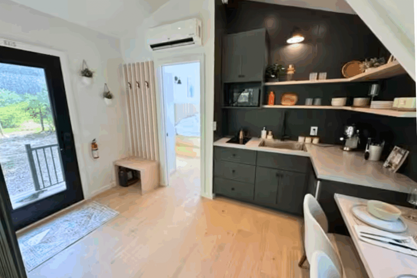 A Frame Park Model tiny home entry and kitchen area in wardensville WV built and delivered by Psy Homes