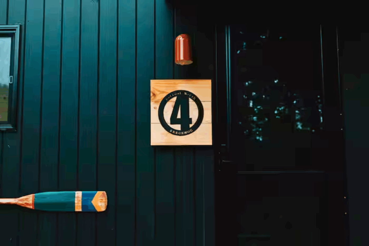 entry to Nook Studio peak park model tiny home in boyne michigan Retreat North cabin 4