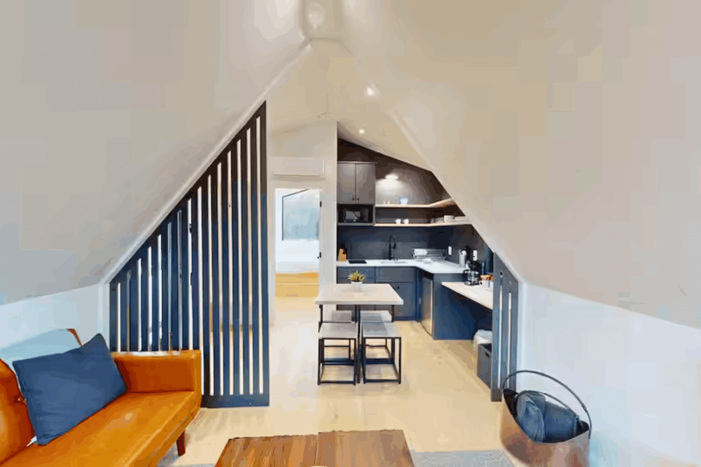 A Frame park model tiny home living room and dining area in broken bow OK