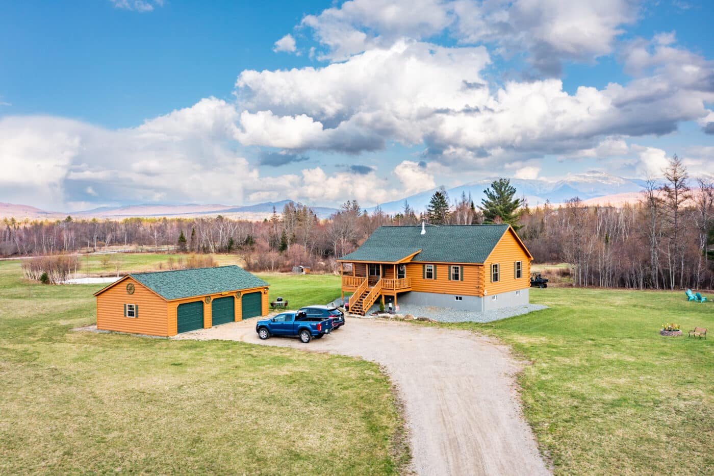 log cabin and garage in jefferson nh
