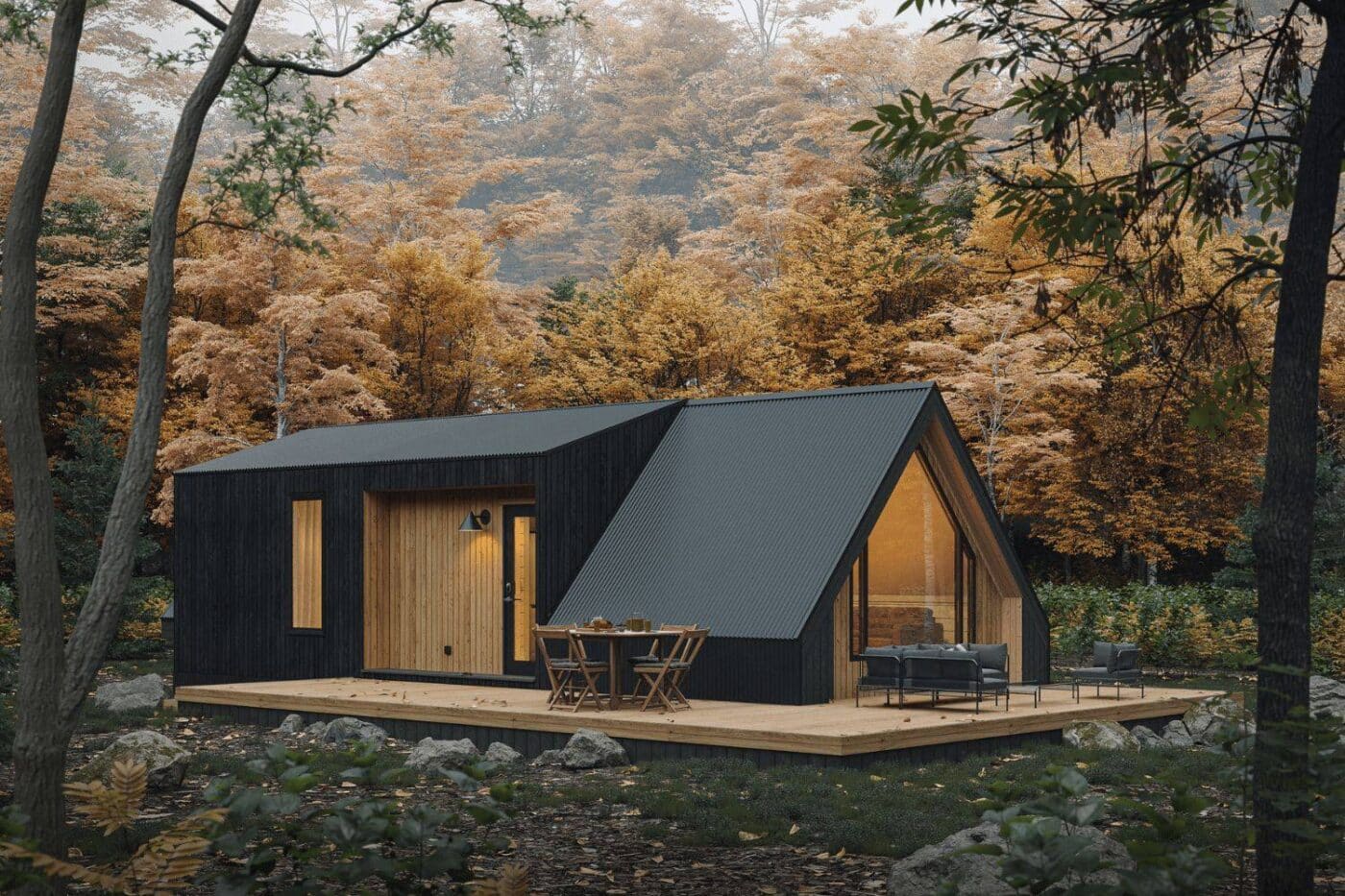 A-Frame ADU in the fall woods at dusk