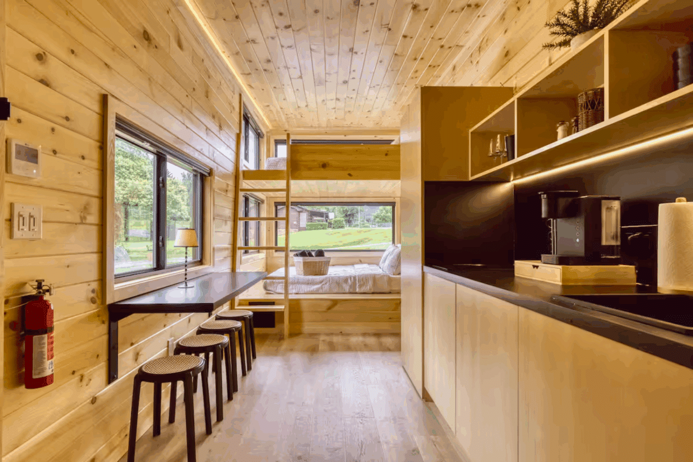 Bunks of Nook Family tiny home with peak finishes in Cosby Tennessee